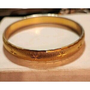 Vintage Monet Gold Tone Bangle Bracelet With Starburst Design